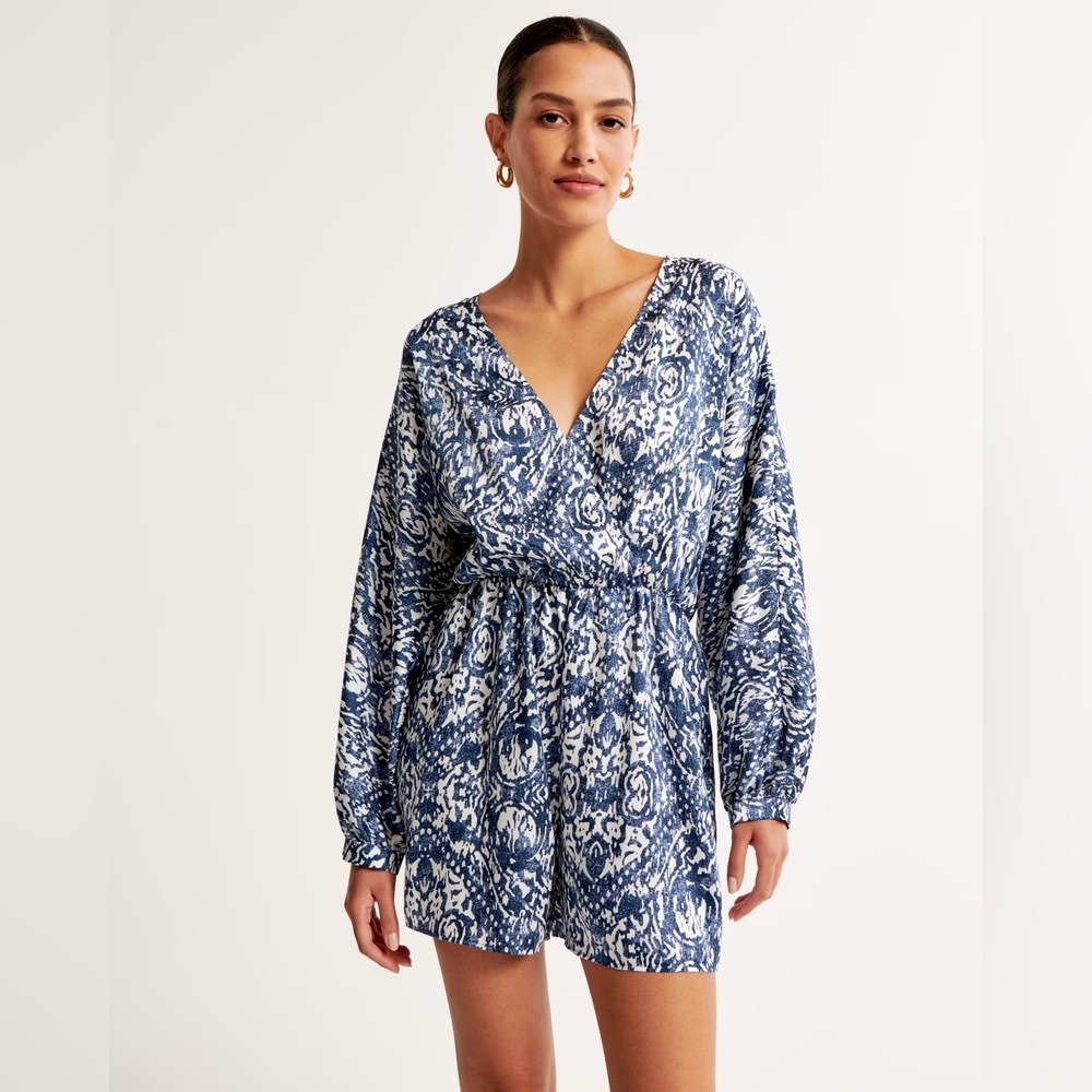 NWT, blue and white romper. Lightweight fabric, on trend peasant sleeves